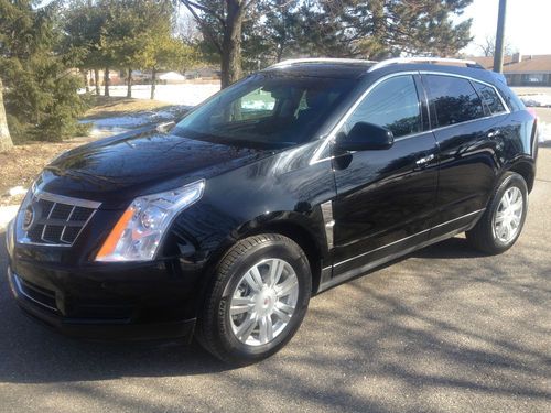 2011 2011 cadillac srx luxury/ rear camera/ low miles/ panoroof/ dvd/ no reserve