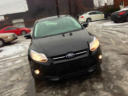 2012 ford focus sel. 8,537 miles. black, very clean. wow