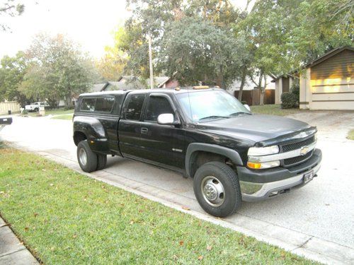 Nice black chevy 3500 dually.  strong puller, good mechanical, good looking.