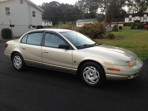 2001 saturn sl2 - gold, ps, pb, heated seats, extra set of rims and snow tires!