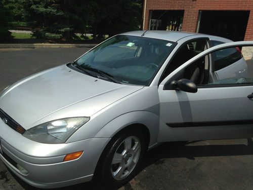 Silver ford focus zx3, year 2003, one owner, remote starter, good condition.