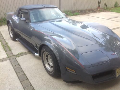 1981 corvette gray with black side pipes great shape automatic t-tops 68,000 mi