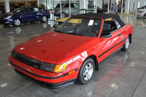 Showroom condition red convertible low miles soft top