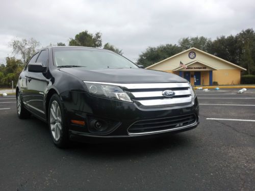 No reserve 2011 ford fusion se , really nice car, low miles.. nr