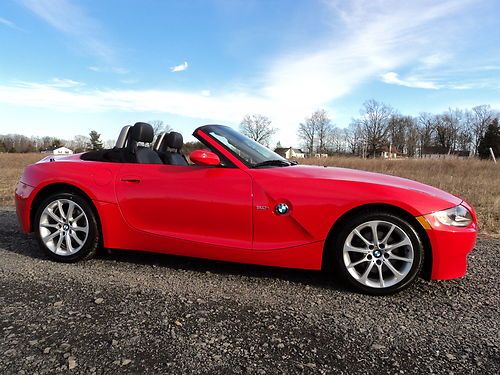 Gorgeous red/black z4 3.0l*6speed*power top*heated seats*low miles*$18997/offer!