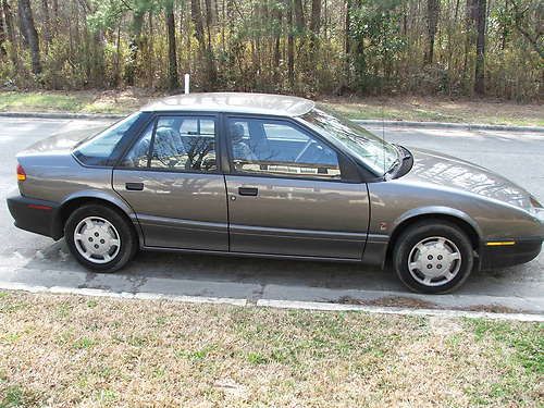 1992 saturn sl1 low miles 68k automatic with air look at the photos 29 mpg city