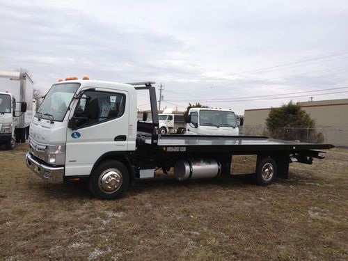2013 mitsubishi fe-180 and a dual-tech 8103 rollback tow body