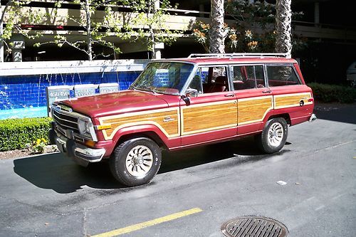 1986 jeep grand wagoneer,selec-trac 4x4,automatic,maroon with red leather,clean