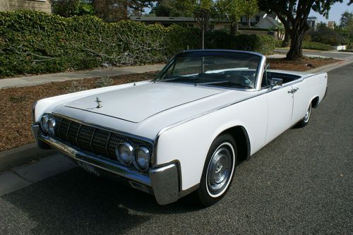 1964~white with black leather~california car with no rust~great example!
