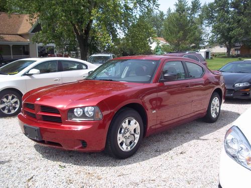 2006 dodge charger, inferno red, rwd, 67k miles, excellent condition
