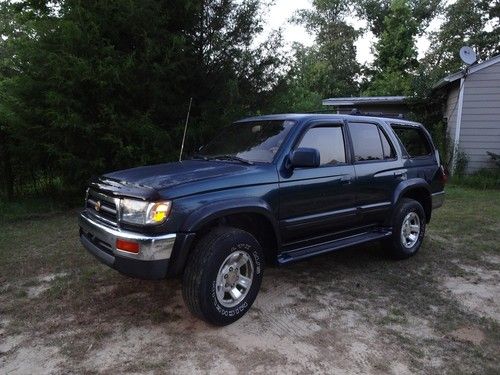 2 1996 toyota 4runners limited edition both are green in color