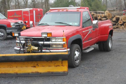 1997 chevy 3500 dual wheel  4x4 pick up with plow