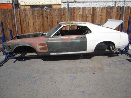 1970 mustang fastback project car with lots of parts