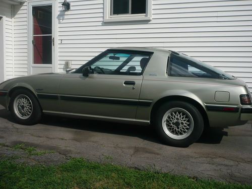 Limited edition 1983 mazda rx7 with a 4 cylinder engine