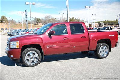 Save $8591 at empire chevy on this new loaded ltz crew 4x4 in ruby red