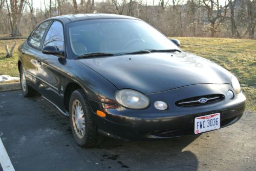 1998 ford taurus full loaded with moon roof multi discs good driving  **as is**