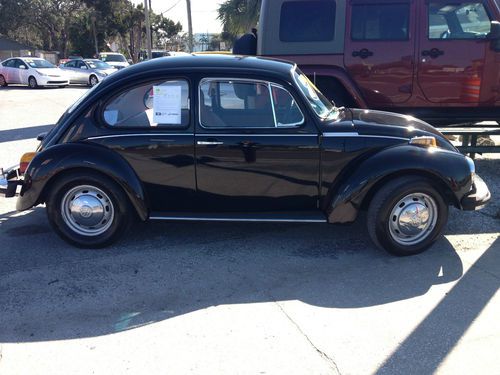 1974 volkswagen beetle black beauty red interior, nada value over $15000 low bid