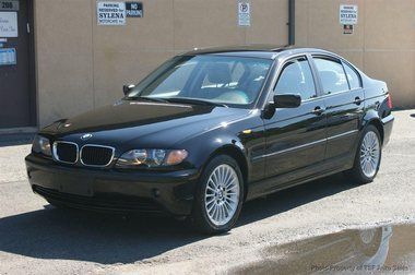 2002 bmw 325xi black !! clean carfax ! only 107k sport package! no reserve!