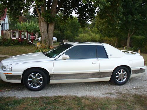 Excellent condition, white diamond, power sunroof, loaded options, chrome