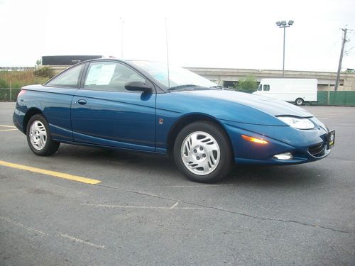 2001 saturn sc2 3 dr coupe / 5 speed manual / 58395 miles / gas saver 34 mpg!