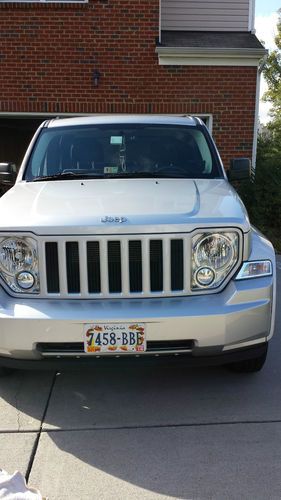 Silver low reserve,super clean jeep with low miles, cd, 4wd and roomy!
