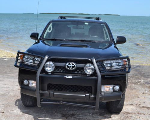 Trail editon with black, 4 wd, brush guards, fog lights and off-road options