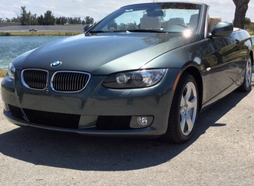 2010 bmw 328i convertible, with only 21,000 miles, low reserve.