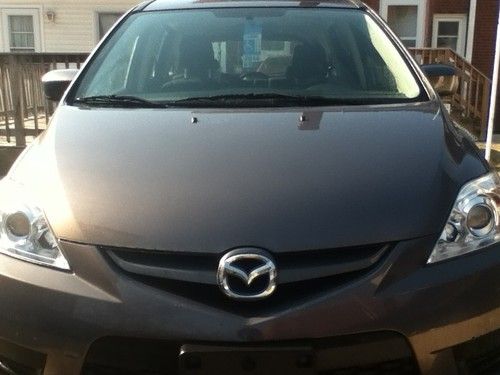 2009.mazda 5.this car is in like-new condition inside and out.no problems at all