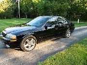 Sport, black, v-8, great condition, loaded, moonroof, alpine stereo with 6 disk