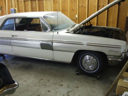 1962 oldsmobile starfire - was a texas car, then garage kept in fairhaven, vt.