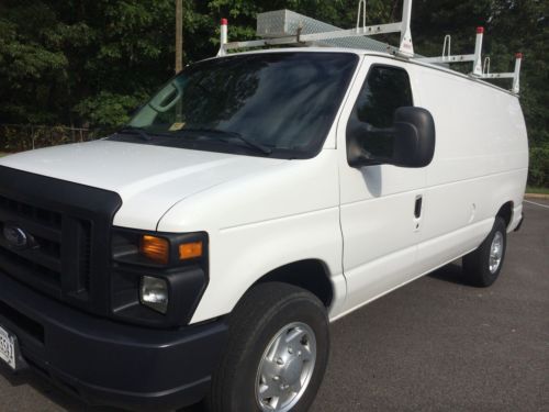 2010 ford e-250 econoline e-series van with metal shelving and ladder rack