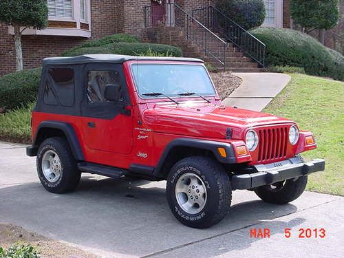 2000 jeep wrangler ...automatic... 6 cylender...red