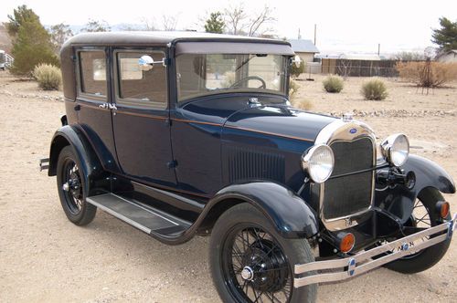 Fully restored model a ford in excellent condition.