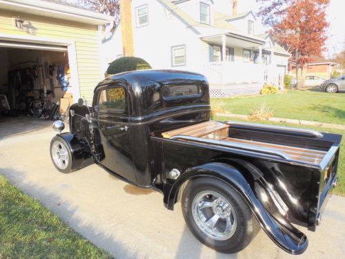 Black 1935 ford pickup truck