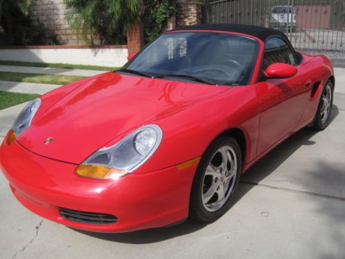 1999 red porsche boxter with black convertible top, low mileage