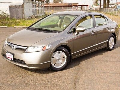 Hybrid-electric 1.3l power mirrors daytime running lights great fuel mileage
