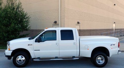 7.3 diesel  xlt power stroke 4x4 auto dually a.r.e. bed cover sweet ride