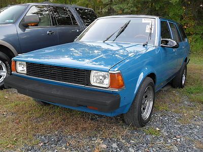 1982 toyota corolla, 4 cylinder, stick, great gas mileage!  great starter car!