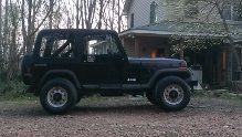 1987 jeep wrangler black.6 cylinder runs great,5 speed, plus extra very nice