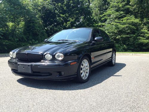 2003 jaguar x-type 2.5l awd - all black - highway miles - well kept - maintained