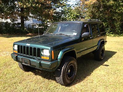 No reserve 2000 lifted jeep cherokee 4x4 straight six cylinder clean