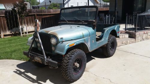 1971 jeep cj5 with 225 v6 and factory t18 four speed.