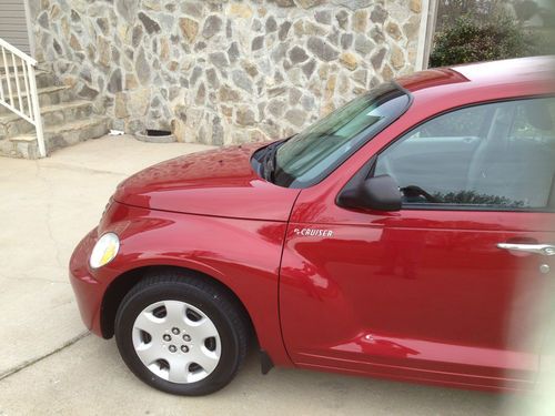 Very nice red 2006 pt cruiser with low miles ready to drive anywhere
