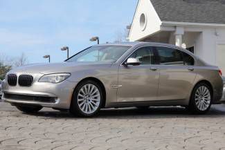 Cashmere silver auto msrp $98,970.00 loaded with options only 32k miles perfect