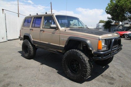 1990 jeep cherokee pioneer 4-door 4wd lifted automatic 6 cylinder no reserve