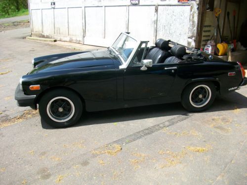 1975 mg midget convertible. black. good condition. manual transmission
