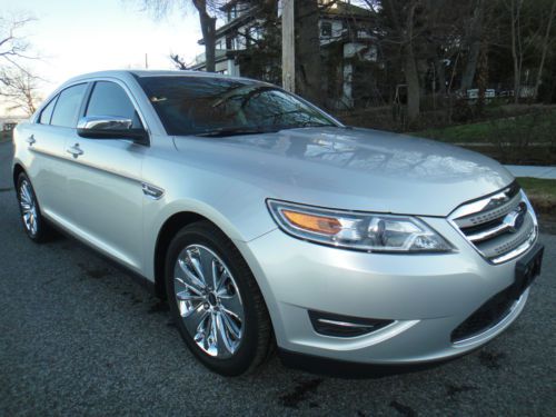 2011 ford taurus. limited. manufacture warranty. looks good. 14k.