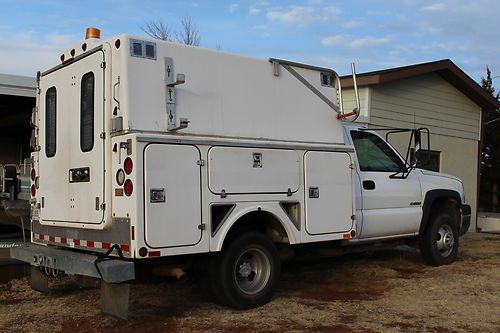 Chevy 1 ton truck w/utility bed. w/ commercial generator. 2005.