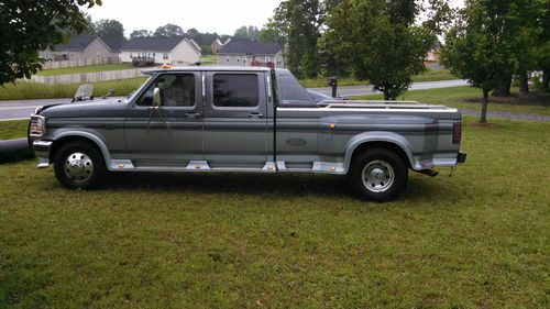 Two tone gray and silver 4 door crew cab fully loaded with leather