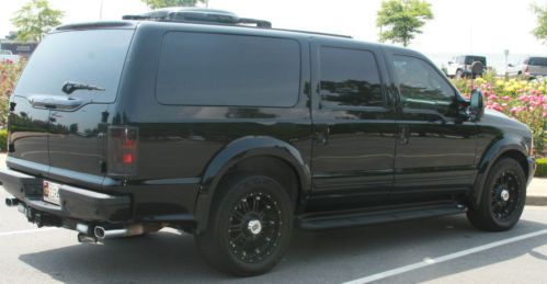 Black 2001 ford excursion executive limo by becker limo - like new!!!